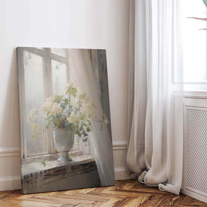 Ivory flowers on the windowsill